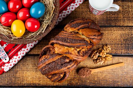 Traditional Romanian Easter table with and meaning Sweetbread and Matzo an unleavened flat bread that is part of Jewish cuisine and forms an integral element of the Passover. Happy Easterの写真素材