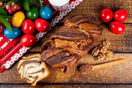 Traditional Romanian Easter table with and meaning Sweetbread and Matzo an unleavened flat bread that is part of Jewish cuisine and forms an integral element of the Passover. Happy Easterの写真素材