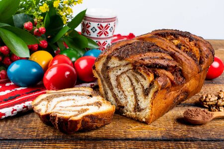 Traditional Romanian Easter table with and meaning Sweetbread and Matzo an unleavened flat bread that is part of Jewish cuisine and forms an integral element of the Passover. Happy Easterの写真素材