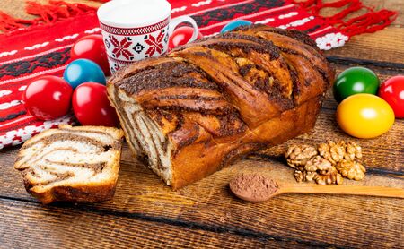 Traditional Romanian Easter table with and meaning Sweetbread and Matzo an unleavened flat bread that is part of Jewish cuisine and forms an integral element of the Passover. Happy Easterの写真素材