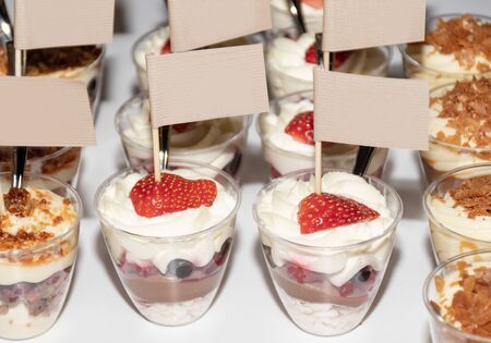 Crunchy chocolate pavlova mini cupcakes glasses appetizers finger food desserts, make your own dessert brunch buffet many ingredients self catering during festive bloggers event candy bar dessertの写真素材