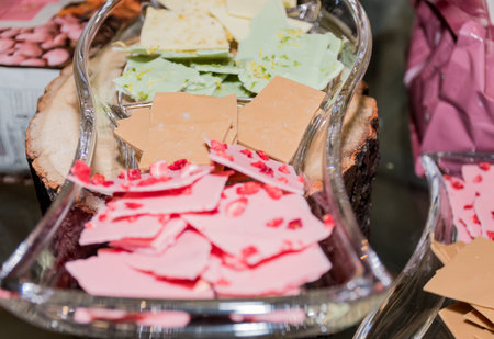 Thin slices, small pieces of colored artisan homemade chocolate snaps bites chipsの写真素材