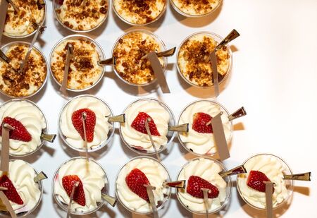 Crunchy chocolate pavlova mini cupcakes glasses appetizers finger food desserts, make your own dessert brunch buffet many ingredients self catering during festive bloggers event candy bar dessertの写真素材