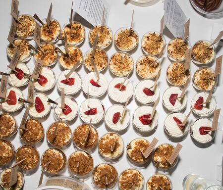 Crunchy chocolate pavlova mini cupcakes glasses appetizers finger food desserts, make your own dessert brunch buffet many ingredients self catering during festive bloggers event candy bar dessertの写真素材