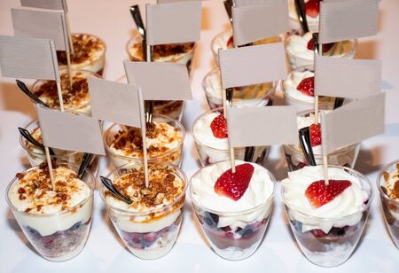 Crunchy chocolate pavlova mini cupcakes glasses appetizers finger food desserts, make your own dessert brunch buffet many ingredients self catering during festive bloggers event candy bar dessertの写真素材