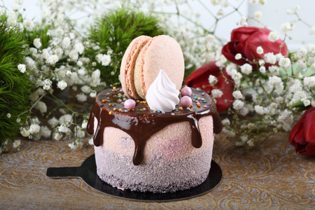 Fresh luxury chocolate dripping cake , macaroon on top dessert. Catering Dining Eating Party Sharing...