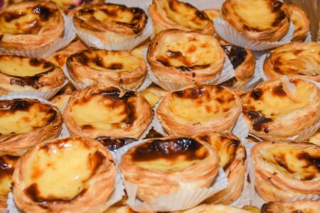 Pasteis de nata, Pastel de nata, also known as Portuguese custard tart, is a Portuguese egg tart pastry dusted with cinnamon.の写真素材