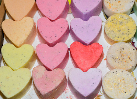 Natural artisanal heart shaped soaps for sale. Displayed for sale at an weekend deco fair for...
