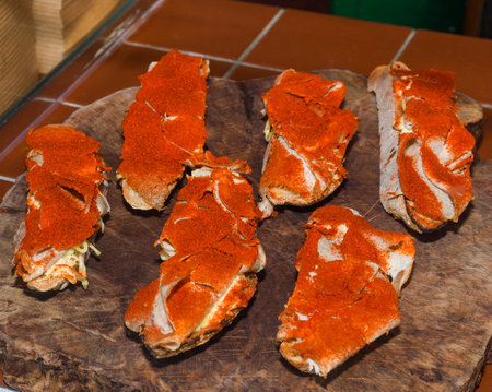 Bruschetta is an antipasto from Italy consisting of grilled bread rubbed with garlic and topped with olive oil and salt. Fresh Food Buffet Brunch Catering Dining Eating Party Sharing Conceptの写真素材