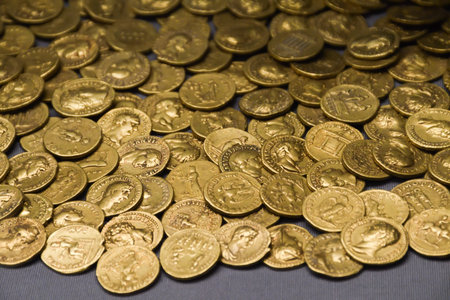 London, United Kingdom, 25th of January 2020: Old gold vintage coins money display at the British...