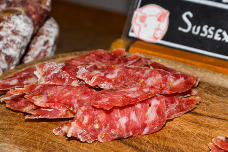 Sausages on Borough market in London. Sausages is large thick French sausages, typically form in...