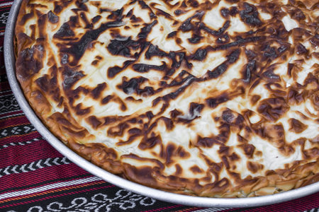 Traditional Turkish cheese pienamed Suborek, Chebureki or Suberek. Meat or cheese filling, oven...