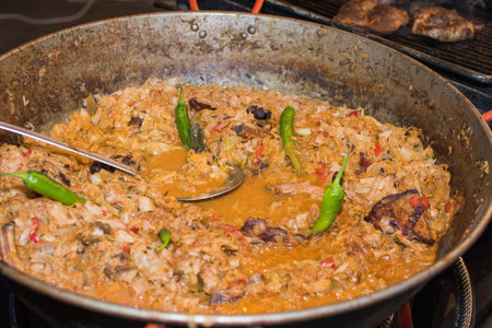 Traditional romanian dish named "sarmale", prepared in traditional oven baked. Minced meat rolls, cabbage and rice specialty dishの写真素材
