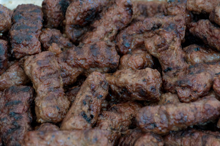 Fresh grilled meat sausage pork chicken minced meat mici during hotel brunch buffet outside outdoor...