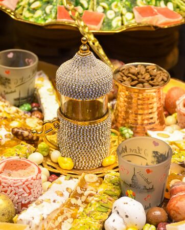 Traditional baklava sweet dessert delights, cataif pastry during hotel brunch buffet outside outdoor in the garden by the pool. Fresh Food Buffet Brunch Catering Dining Eating Party Sharing Conceptの写真素材