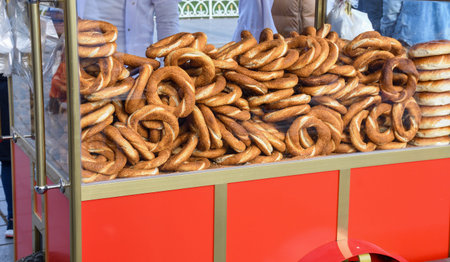 Simit is a Turkish loop-shaped bread, encrusted with sesame seeds, and you can find it encrusted...