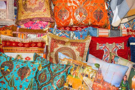 Istanbul, Turkish, 20.12.2019: Turkish design pillows stack pile cafe or restaurant, shisha hookah terraceの写真素材