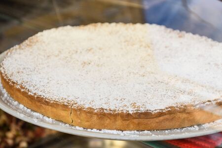 Apple pastry tarte tatin, french dessert with powdered sugar on topの写真素材