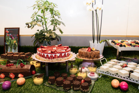 Large assortment of desserts, muffins, cakes, tarts. Candy bar during wedding reception or brunch...