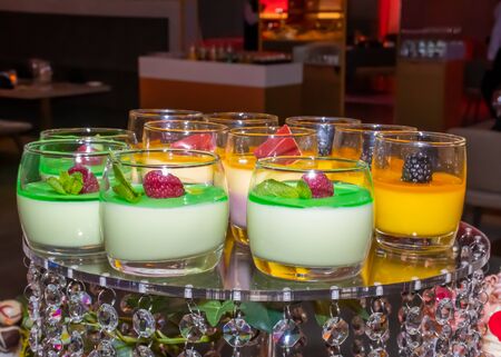 Festive brunch buffet celebration for special occasions like Valentine's Day, Mother's Day, Woman's Day, catering and candy bar self service events. Mousse, cupcakes, pop cakes and macaroons displayの写真素材