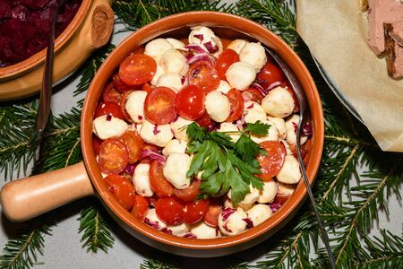Caprese salad. Mozzarella and cherry tomatoes. Food selection during Sunday brunch buffet in hotel. Fresh Food Buffet Brunch Catering Dining Eating Party Sharing Conceptの写真素材