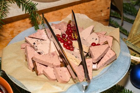 Duck foie gras slices with cranberry. Food selection during Sunday brunch buffet in hotel. Fresh Food Buffet Brunch Catering Dining Eating Party Sharing Conceptの写真素材