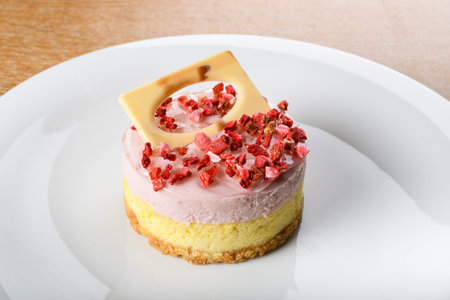 Duo cheese cake with strawberries. Cheesecake is a sweet dessert consisting of one or more layers....