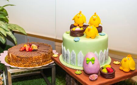 Large assortment of desserts, muffins, cakes, tarts. Candy bar during wedding reception or brunch buffet in a hotel or restaurant catering eventの写真素材