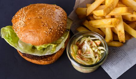 A veggie vegan burger is a burger patty that does not contain meat. These burgers may be made frm ingredinets like beans, grains, seeds or fungi such as mushroomsの写真素材