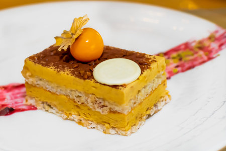 Selection of desserts: amandine, meringue with chocolate and strawberries, caramel cake, in a...