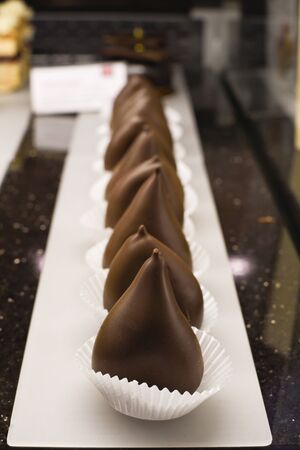 Various types of cakes, tart, mousse, pies for sale in bakery or pastry shop, gourmet luxury concept for candy bar. Happy birthday many slices of dessert specialties, luxury gourmet and elegant recipeの写真素材