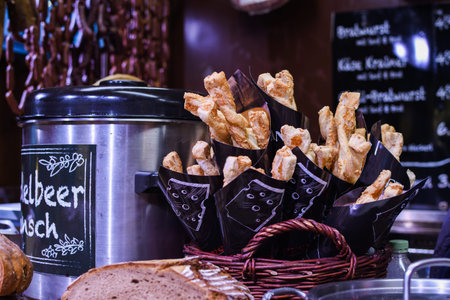 Fresh puff pasty twisted in cones, ready to be served during street food festival in Vienna Austria