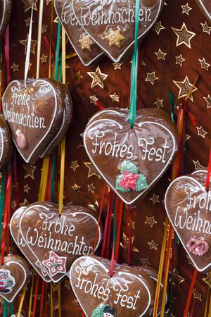 Many gingerbread cookies over the counter, during Vienna Christmas Market. Heart, snow flake, unicorn shape sweet dessert for sale,festival winter celebration. Merry Christmas candy bar buffet conceptの写真素材