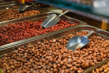 Sugar coated caramelized peanuts for sale during Christmas market in Vienna, Austria.の写真素材