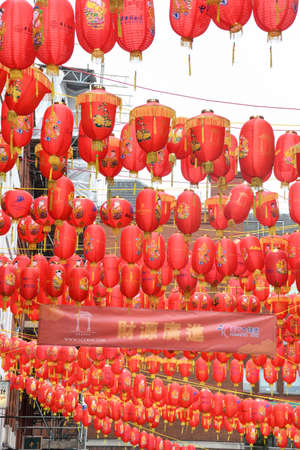 London, United Kingdom, 25th of January 2020: Chinese red lanterns illuminated lamps hanging during Chinese New Year's celebrationのeditorial素材