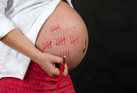 Pregnant woman with twinsの写真素材