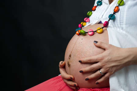 Pregnant woman with twinsの写真素材