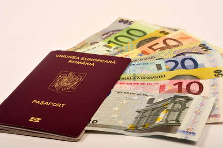 European Union passport and different euro banknotesの写真素材