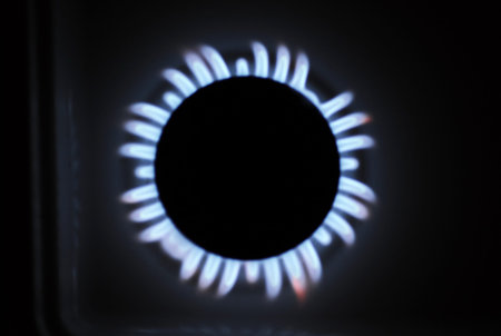 Natural gas flame on the stoveの写真素材