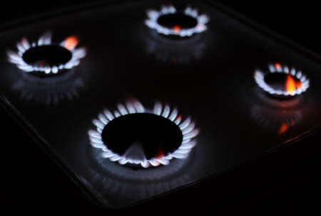 Natural gas flame on the stoveの写真素材
