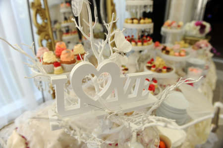 Wedding candy bar and Love inscriptionの写真素材