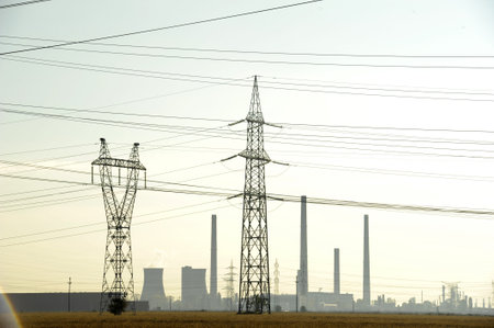 Electricity pylons on the field - daytime shot
