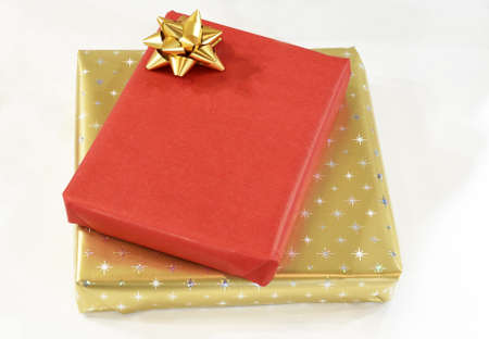 Wrapped presents in red paperの写真素材
