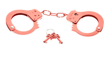 Red handcuffs as a sex toyの写真素材