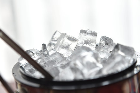 Ice cubes in the bucket