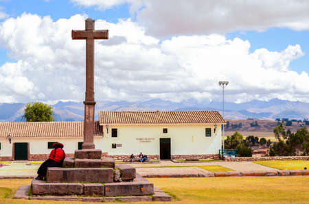 CHINCHERO, PERU- JUNE 3, 2013: Mud brick buildings in Chinchero surrounded by traditional Inca terraces on the hillsideのeditorial素材