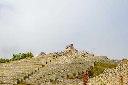 MACHU PICCHU, CUSCO REGION, PERU- JUNE 4, 2013: Panoramic view of the 15th-century Inca citadel...