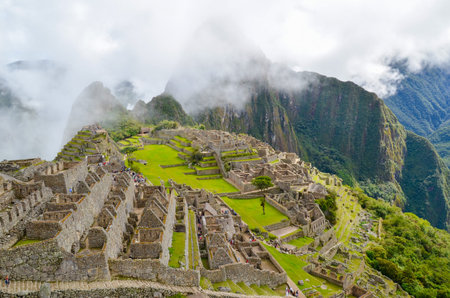 MACHU PICCHU, CUSCO REGION, PERU- JUNE 4, 2013: Panoramic view of the 15th-century Inca citadel Machu Picchuのeditorial素材