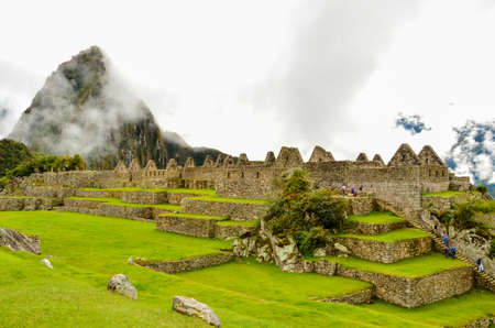 MACHU PICCHU, CUSCO REGION, PERU- JUNE 4, 2013: Panoramic view of the 15th-century Inca citadel Machu Picchu.のeditorial素材