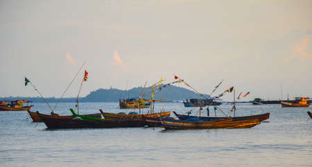NGAPALI, MYANMAR- SEPTEMBER 27, 2016: Traditional burmese boat at sunsetのeditorial素材